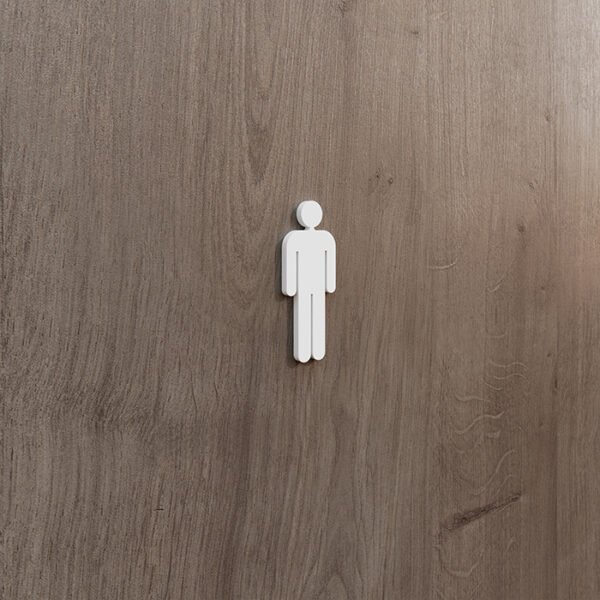 "Pictograma con símbolo de hombre fabricado en Corian en un baño moderno"